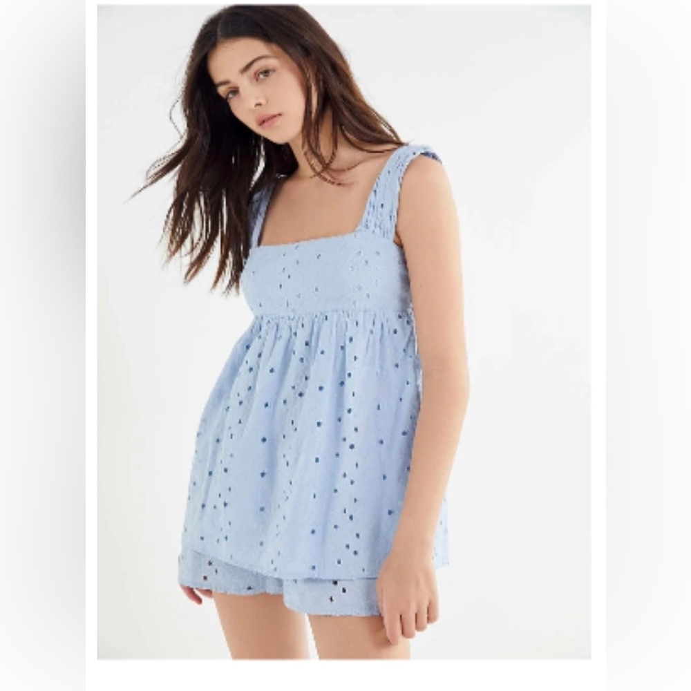 Urban Outfitters: Size Medium. Light blue eyelet romper.